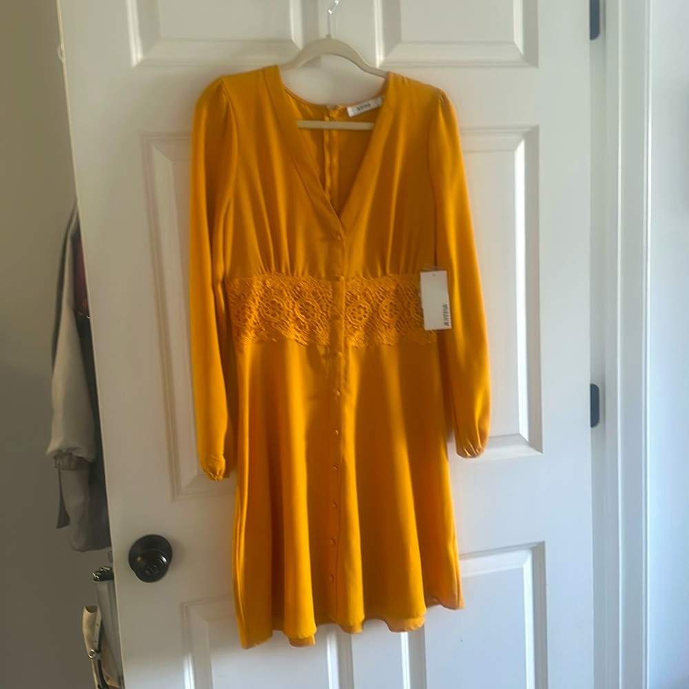 Yellow button down dress with crochet detail